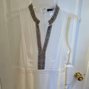 White embellished shorts one piece.